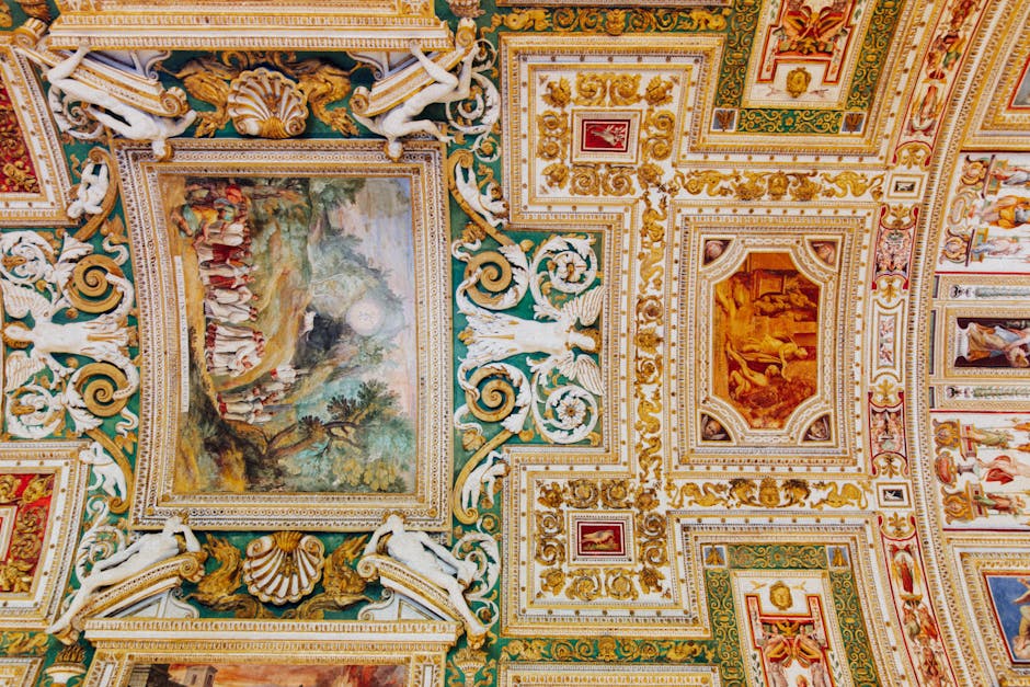 Intricately ornamented Baroque ceiling featuring colorful frescoes and gilded designs.