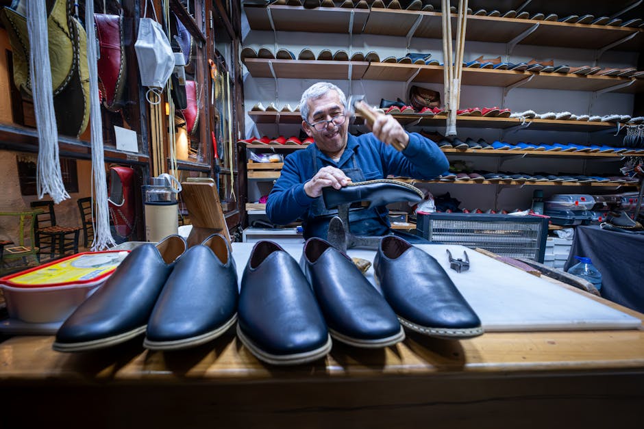 An artisan in Safranbolu, Türkiye, crafting leather shoes by hand, showcasing traditional shoemaking skills.